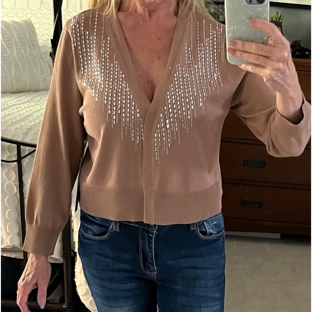 Adorable bedazzled sweater.